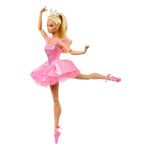 Barbie doll in a pink dress and tiara on a white background