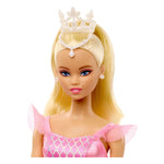 Barbie doll with blonde hair, blue eyes, a pink dress, and white tiara on a white background